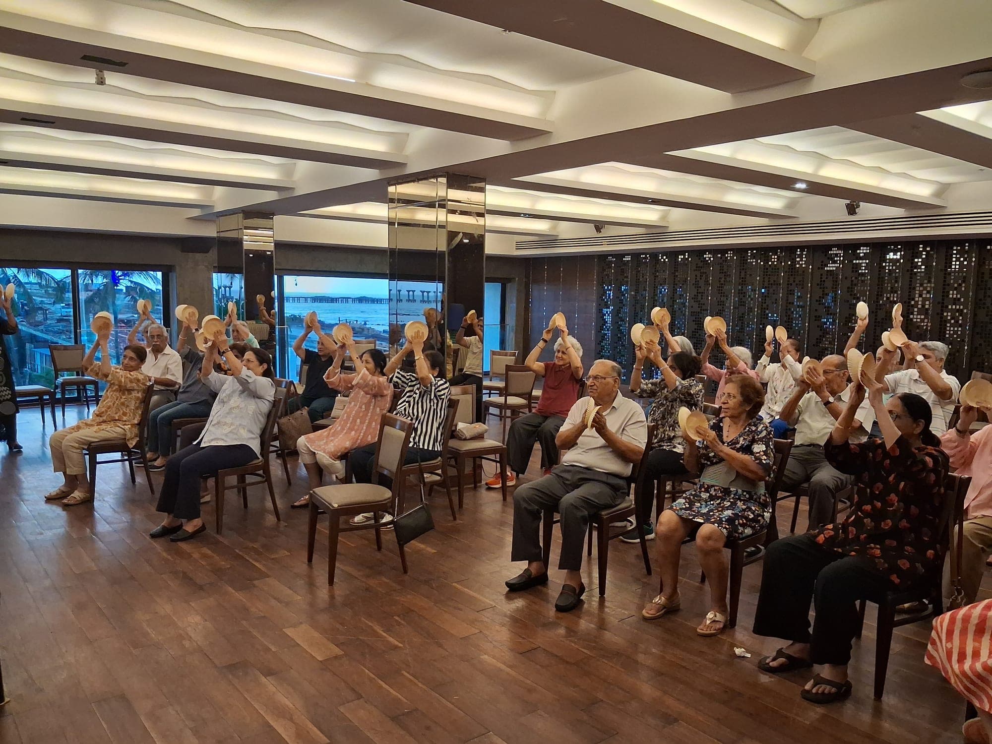Seated exercise session with members at Otters Club